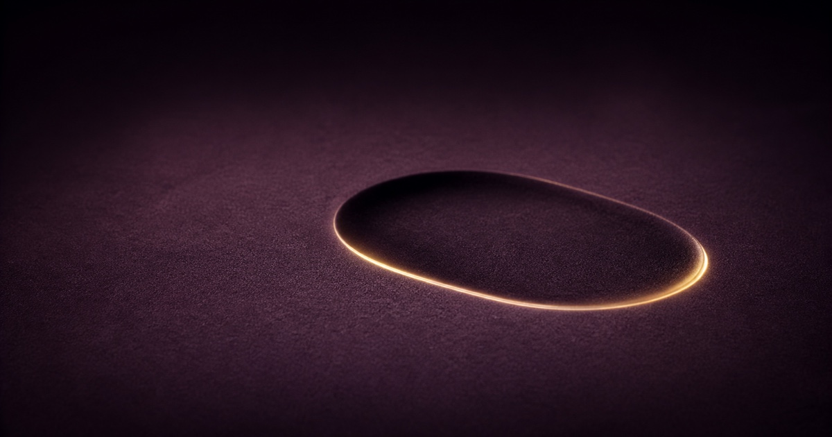 Gold-rimmed empty impression in a deep violet surface